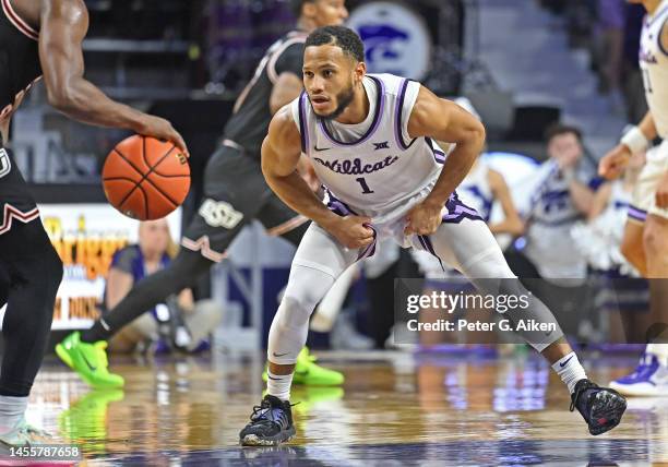 Markquis Nowell of the Kansas State Wildcats gets set on defense against the Oklahoma State Cowboys in the second half at Bramlage Coliseum on...