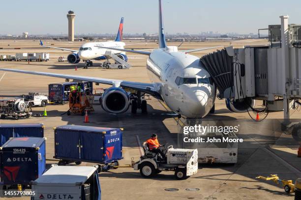 Delayed flights prepare to depart from Dallas-Fort Worth International Airport on January 11, 2023 in Dallas, Texas. Thousands of flights throughout...