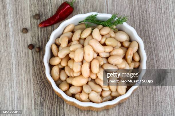 directly above shot of beans in bowl on table,arad,romania - 平豆 ストックフォトと画像