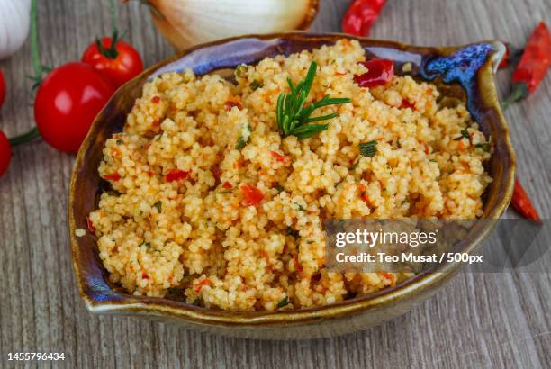 high angle view of food in bowl on table,arad,romania - quinoa stockfoto's en -beelden