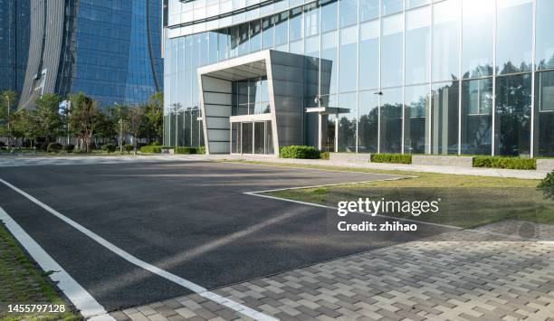 the road at the gate of the city office building - entrance sign stock pictures, royalty-free photos & images