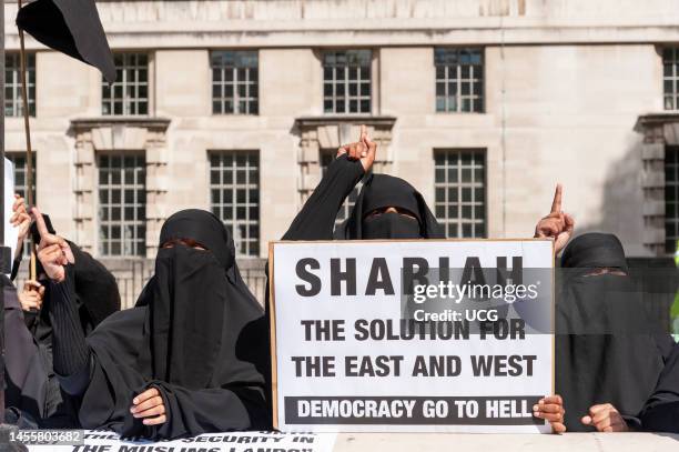 Fanatical Islamist women demonstrating at a protest for Shariah law, London, UK.