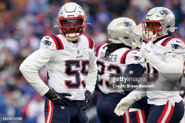 Josh Uche of the New England Patriots looks on during the second quarter against the Buffalo Bills at Highmark Stadium on January 08, 2023 in Orchard...