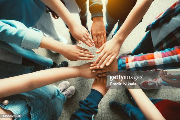 3,231 Supporting Hands Student Stock Photos, High-Res Pictures, and ...