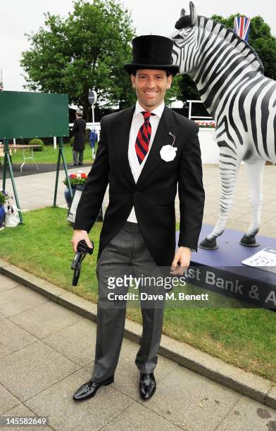 Louis Dowler attends Investec Derby Day at the Investec Derby Festival, the first official event of the Queen's Diamond Jubilee weekend, at Epsom...