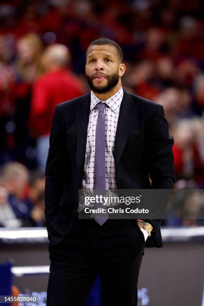 Associate head coach Will Conroy of the Washington Huskies during the game against the Arizona Wildcats at McKale Center on January 05, 2023 in...