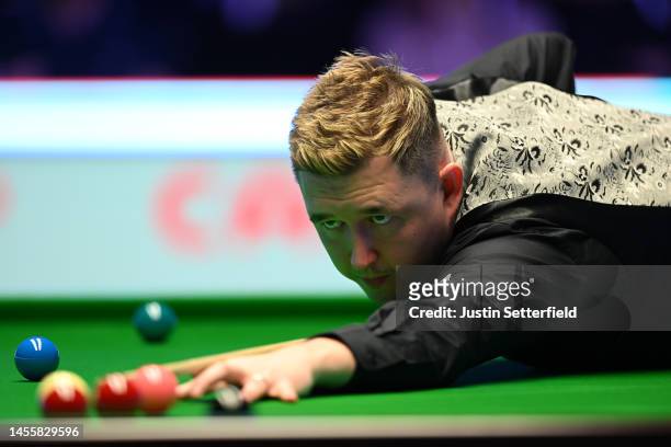 Kyren Wilson of England plays a shot during his round 1 match against Stuart Bingham of England on Day Four of the Cazoo Masters at Alexandra Palace...