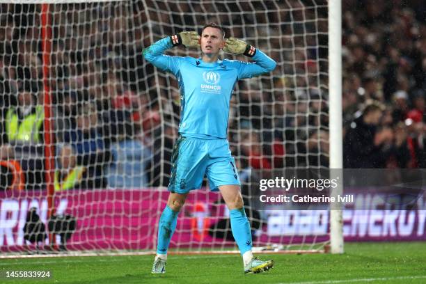 Dean Henderson of Nottingham Forest celebrates after saving a penalty from Ruben Neves of Wolverhampton Wanderers in the shootout during the Carabao...