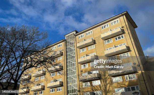 Windows in a 1960s block of flats overlook the city centre, on January 11, 2023 in Bath, England. The UK is currently facing a cost of living crisis,...