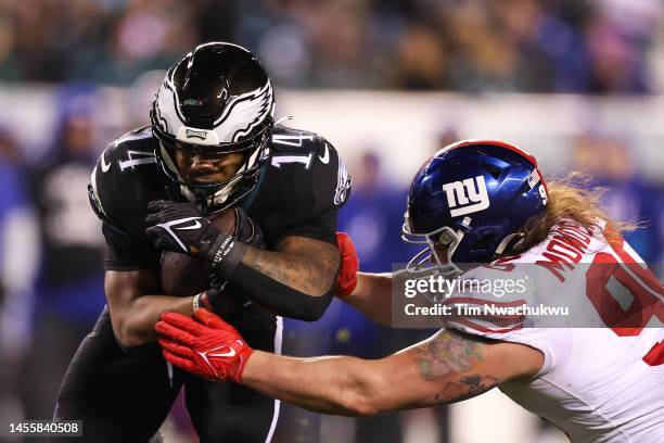Kenneth Gainwell of the Philadelphia Eagles is tries to rush past Henry Mondeaux of the New York Giants at Lincoln Financial Field on January 08,...