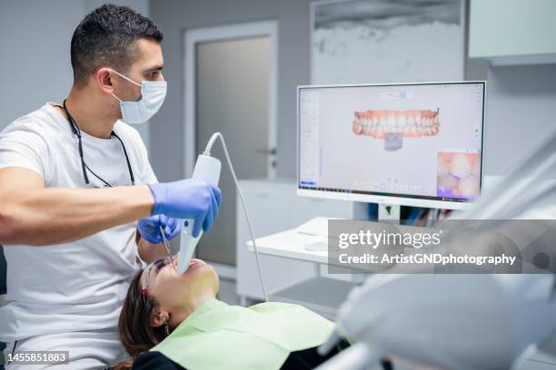 dental procedure with the help of 3d tooth scanner technology. - 3d skanning bildbanksfoton och bilder