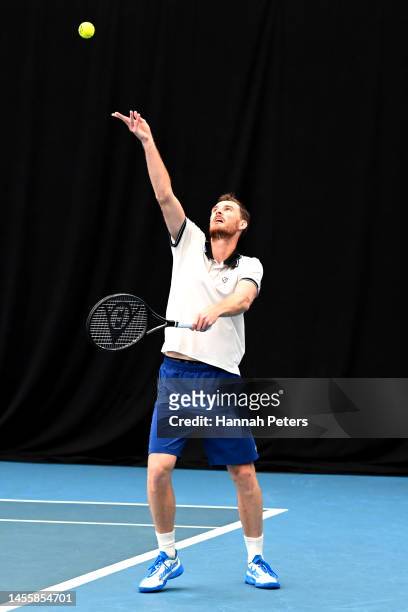 Jamie Murray of Great Britain serves during his doubles match with partner Michael Venus of New Zealand against Nathaniel Lammons of USA and Jackson...