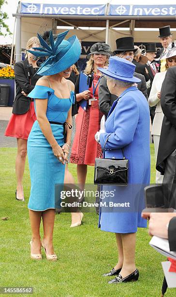 Singer Katherine Jenkins meets Queen Elizabeth II during Investec Derby Day at the Investec Derby Festival, the first official event of the Queen's...