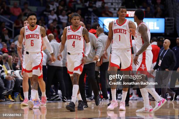 Alperen Sengun, Kenyon Martin Jr. #6, Jalen Green, Jabari Smith Jr. #1 and Kevin Porter Jr. #3 of the Houston Rockets react during a game against the...