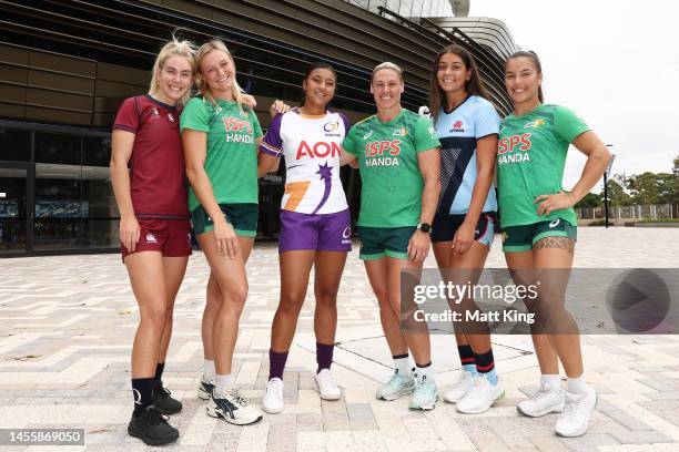Sophie Duff of Queensland 7's, Faitala Moleka of the University Women's 7s Rising Stars and Milla Elaro of NSW 7's pose alongside Australian 7's...