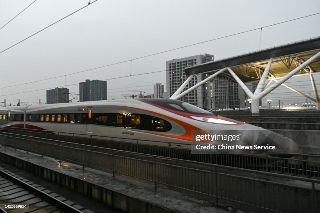 Express Train Movement A 'Vibrant Express' train setting out from Hong Kong West Kowloon ...
