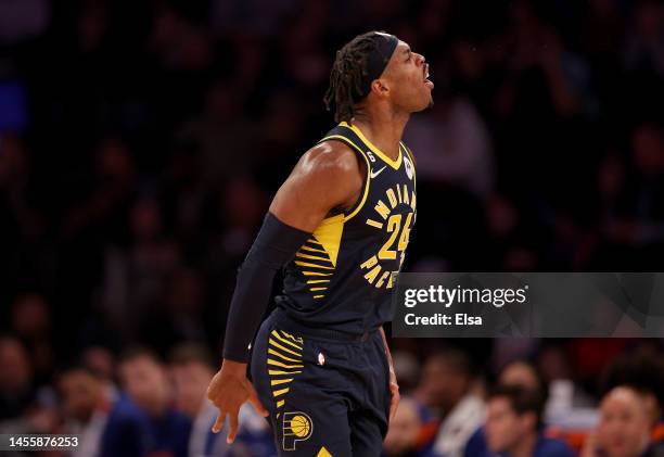 Buddy Hield of the Indiana Pacers celebrates his three point shot in the fourth quarter against the New York Knicks at Madison Square Garden on...