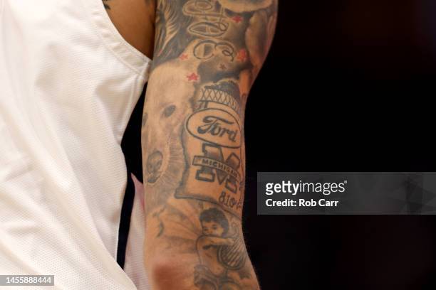 Detail view of the tattoos on the right arm of Kyle Kuzma of the Washington Wizards during the second half against the Chicago Bulls at Capital One...