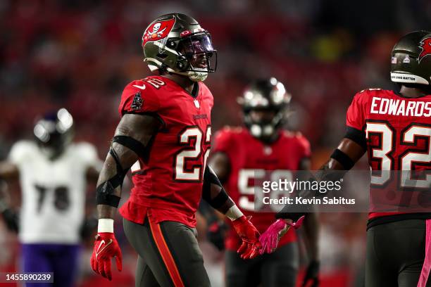 Keanu Neal of the Tampa Bay Buccaneers high fives teammates after a play during an NFL football game against the Baltimore Ravens at Raymond James...