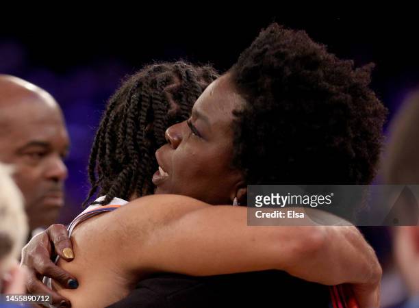 Jalen Brunson of the New York Knicks is congratulated by comedian Leslie Jones after the win over the Indiana Pacers at Madison Square Garden on...