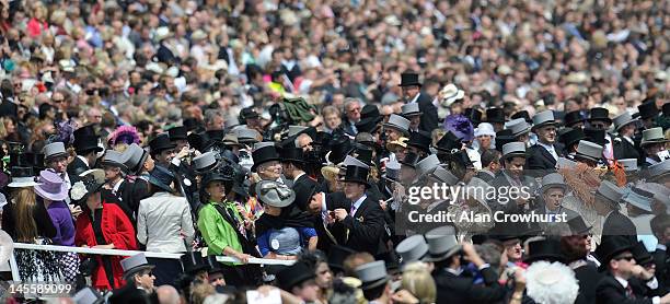 Top hat and tails during the Investec Derby, at the start of the weekend marking the Queen's Diamond Jubilee celebrations, at Epsom Racecourse on...