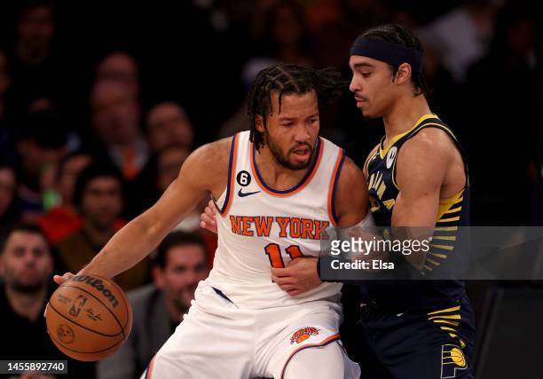 Jalen Brunson of the New York Knicks heads for the net as Andrew Nembhard of the Indiana Pacers defends at Madison Square Garden on January 11, 2023...