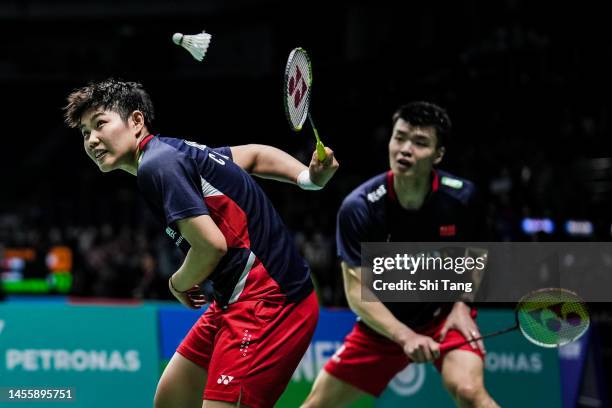 Wang Yilyu and Huang Dongping of China compete in the Mixed Doubles Second Round match against Kim Won Ho and Jeong Na Eun of Korea on day three of...