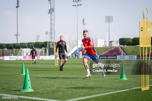 Joshua Kimmich of FC Bayern Muenchen sprints during a training session on January 11, 2023 in Doha, Qatar.