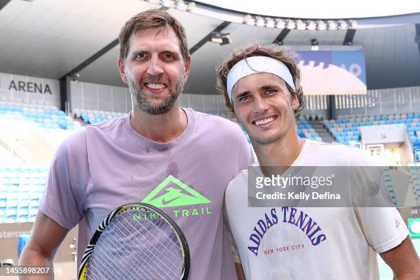 Dirk Nowitzki and Alexander Zverev pose during media opportunity ahead of the 2023 Australian Open at Melbourne Park on January 12, 2023 in...
