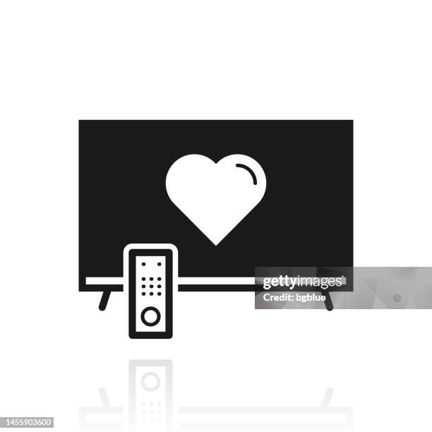 tv with heart. icon with reflection on white background - looking at screen reflection stock illustrations