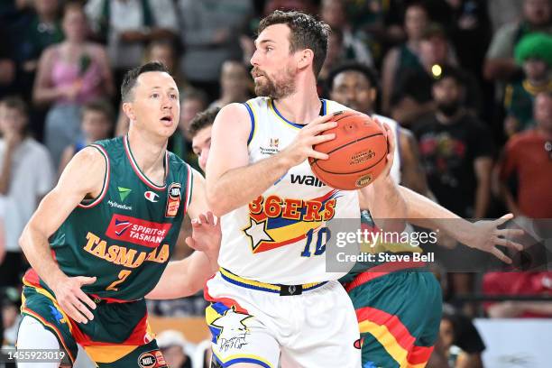 Mitch McCarron of the 36ers passes the ball during the round 15 NBL match between Tasmania Jackjumpers and Adelaide 36ers at MyState Bank Arena, on...
