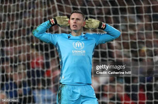 Dean Henderson of Nottingham Forest celebrates after making his first save during the penalty shootout of the Carabao Cup Quarter Final match between...