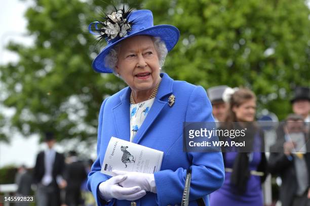 Queen Elizabeth II views the horses in the parade ring before the Diamond Jubilee Coronation Cup race on Derby Day on June 2, 2012 in Epsom, England....