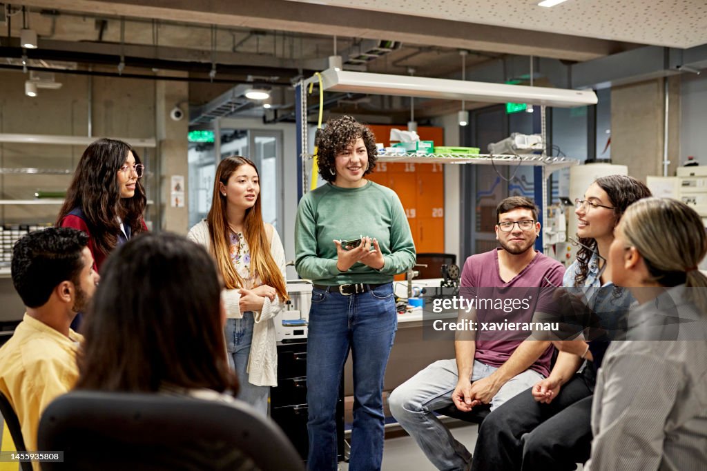 Technical college students exchanging ideas