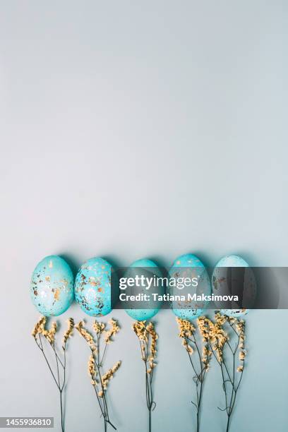 easter eggs on blue background. festive concept. - easter religious stock pictures, royalty-free photos & images