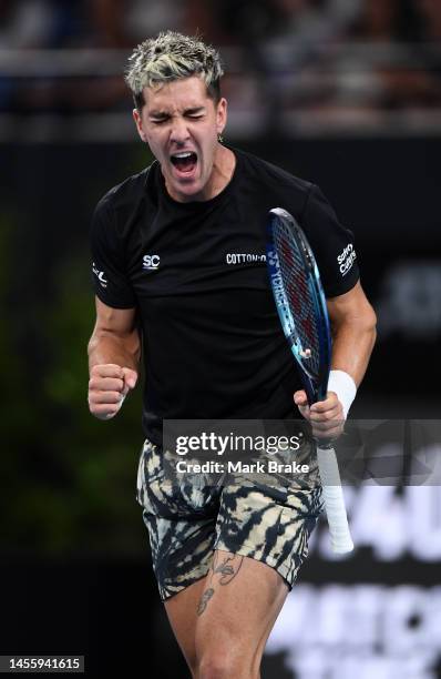 Thanasi Kokkinakis of Australia celebrates winning a game against Miomir Kecmanovic of Serbiaduring day four of the 2023 Adelaide International at...