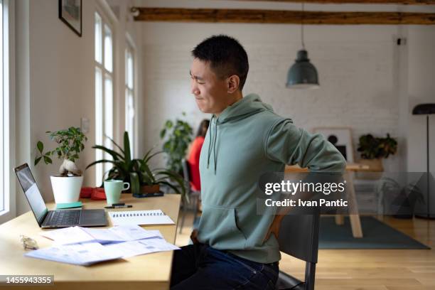 ugh, my back hurt a lot! - bad posture stock pictures, royalty-free photos & images