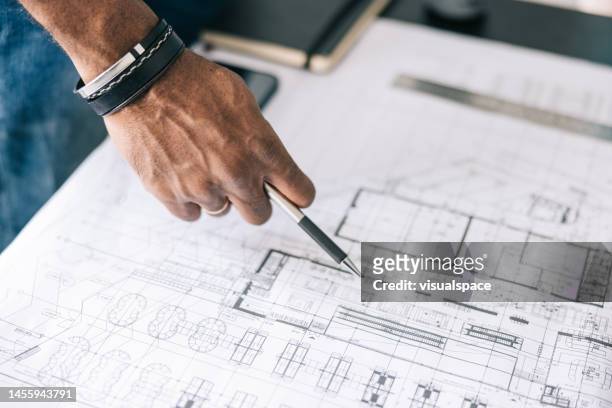 architect working on blueprints - close up of blueprints stock pictures, royalty-free photos & images
