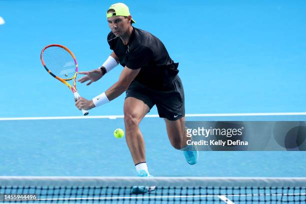 Rafael Nadal of Spain plays a backhand during an open practice session ahead of the 2023 Australian Open at Melbourne Park on January 12, 2023 in...