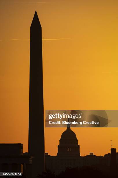 the washington monument and us capitol at sunrise - washington monument stock pictures, royalty-free photos & images