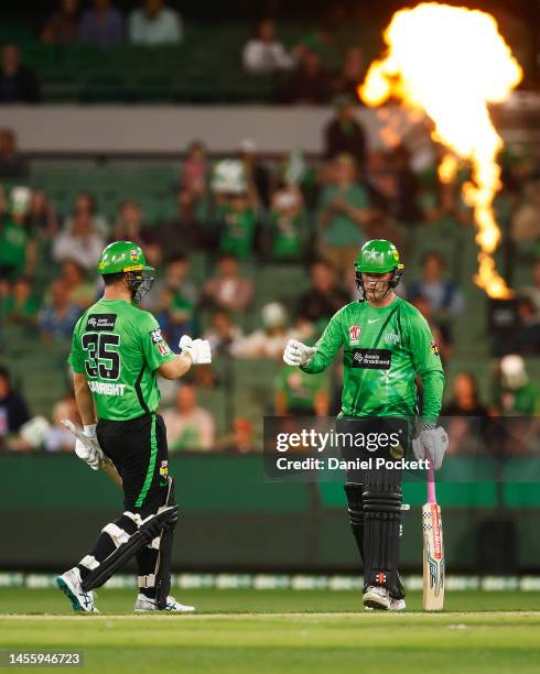 Tom Rogers of the Stars celebrates with Hilton Cartwright of the Stars after making a half century during the Men's Big Bash League match between the...