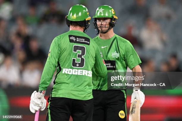 Tom Rogers and Hilton Cartwright of the Stars celebrate scoring the winning runs during the Men's Big Bash League match between the Melbourne Stars...