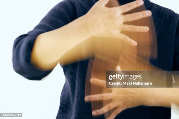 the will is expressed by the movement of the hands. - 調布 stockfoto's en -beelden