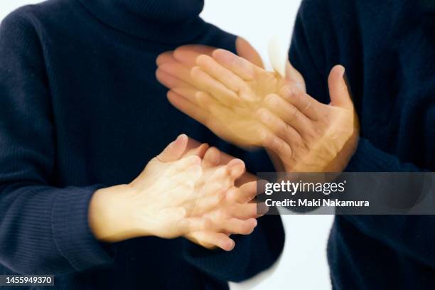 the will is expressed by the movement of the hands. - 調布 stockfoto's en -beelden
