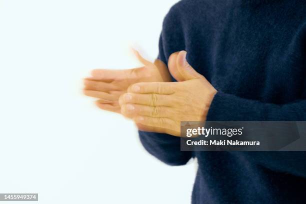 the will is expressed by the movement of the hands. - 調布 stockfoto's en -beelden