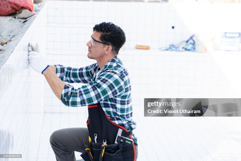 Working In A Pool Construction Worker Working In Swimming Pool Under Construction High ...