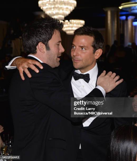 71st ANNUAL GOLDEN GLOBE AWARDS -- Pictured: Actors Ben Affleck and Bradley Cooper attend the 71st Annual Golden Globe Awards held at the Beverly...