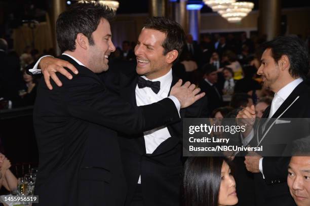 71st ANNUAL GOLDEN GLOBE AWARDS -- Pictured: Actors Ben Affleck and Bradley Cooper at the 71st Annual Golden Globe Awards held at the Beverly Hilton...
