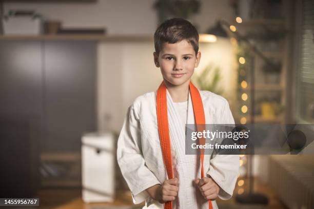 young fighter - judo kids stock pictures, royalty-free photos & images