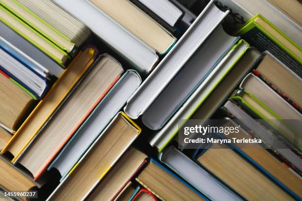 A couple of boxes sitting on top of an open book photo – Free Flatlay Image  on Unsplash